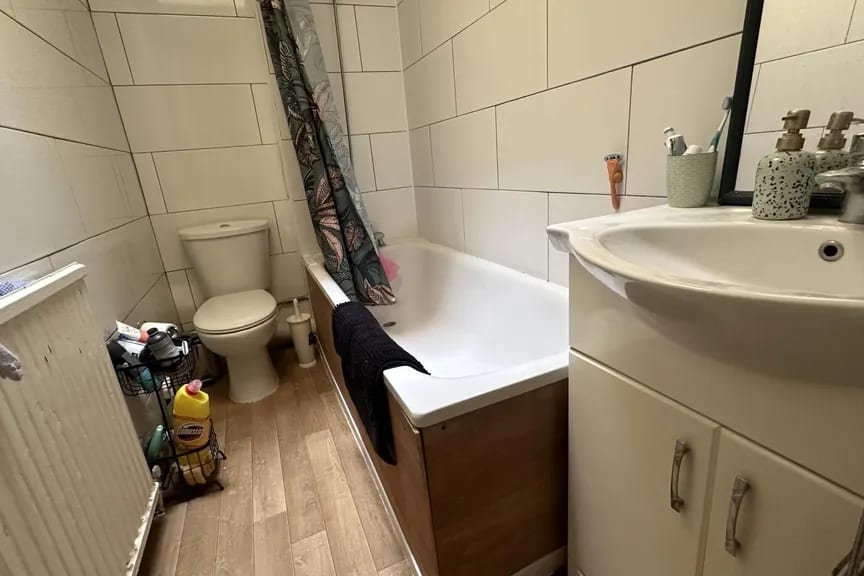 Bathroom — dull to bright and clean — as photographed