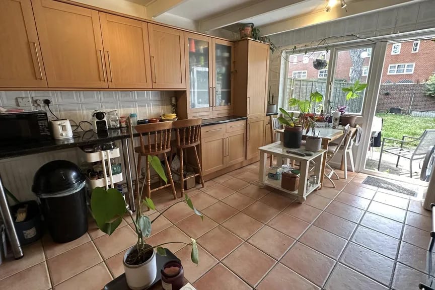 Kitchen — cleared and professionally lit — as photographed